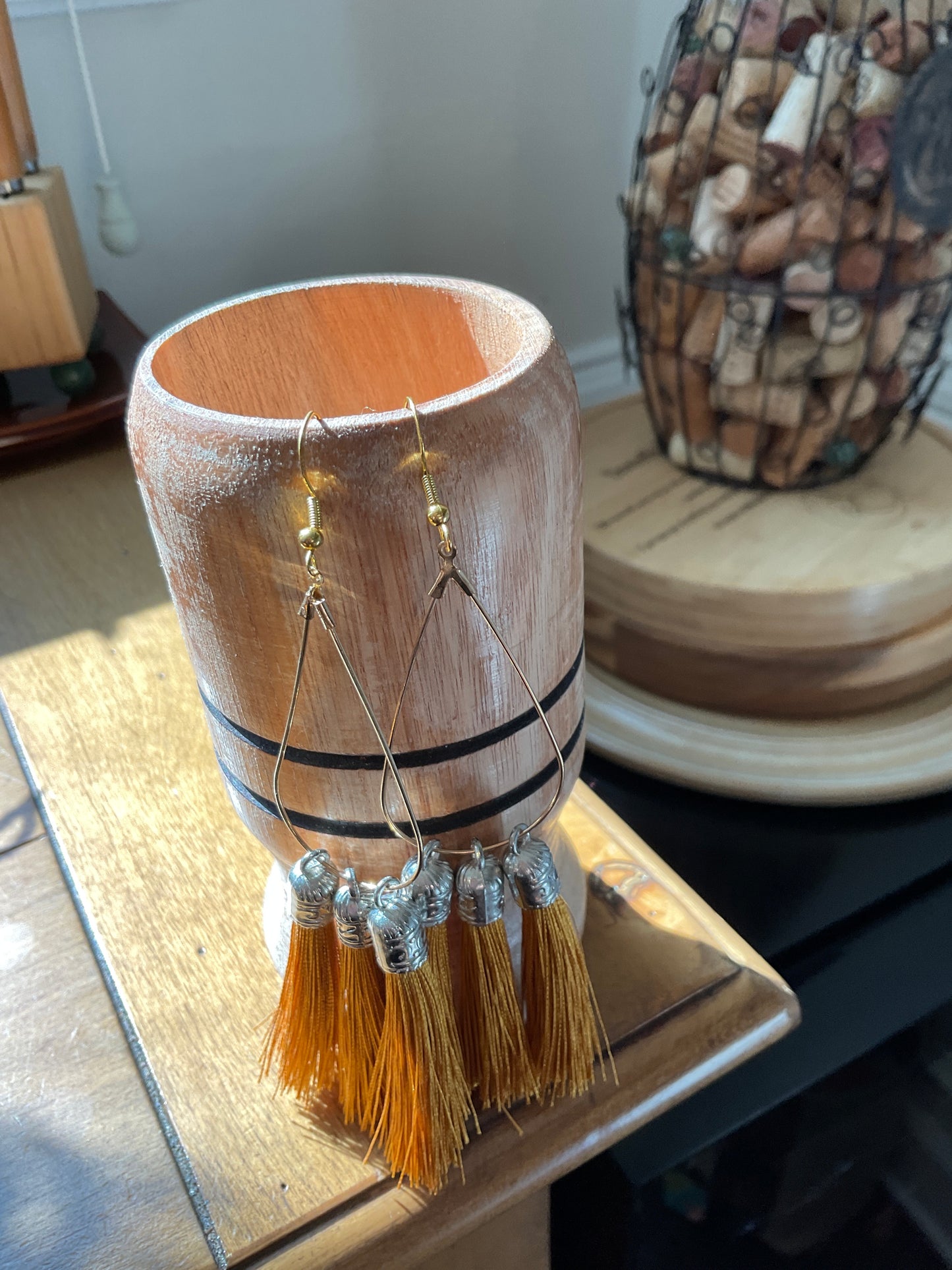 Fringe belief earrings: bronze