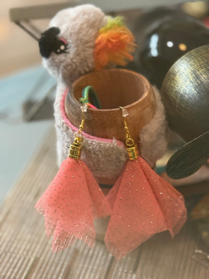 Fringe belief earrings— cults always promise space travel