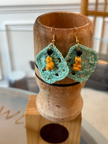 Not your granny square earrings—Guadalajara clay cat
