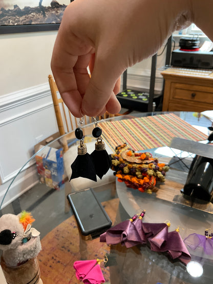 Cults always promise space travel earrings—dancing midnight