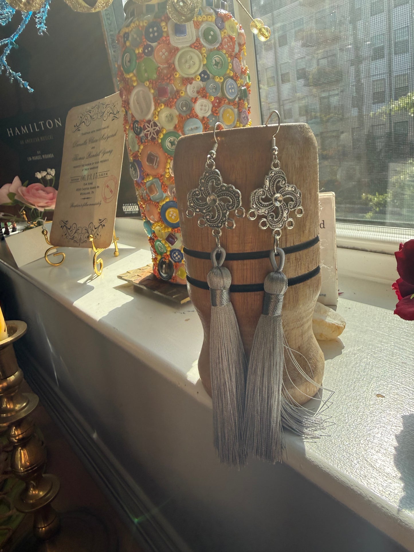 Fringe belief earrings: gray and distinguished