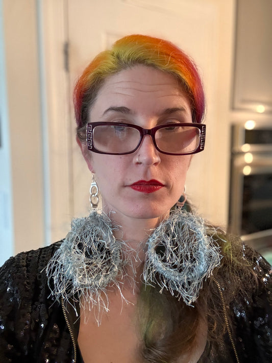 Circular logic earrings—silver blue with handcuff charms