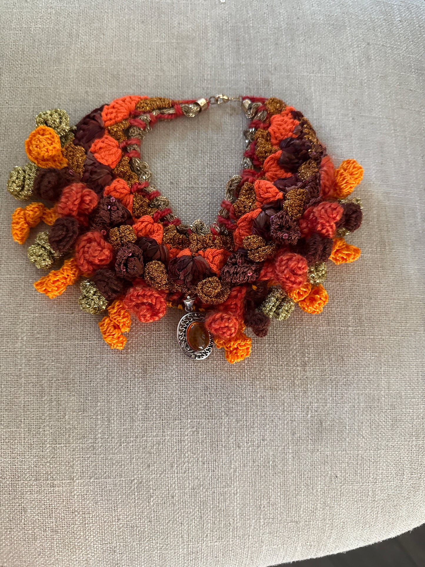 Love bomb collar: orange and sparkly with a real amber pendant