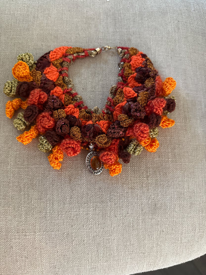 Love bomb collar: orange and sparkly with a real amber pendant