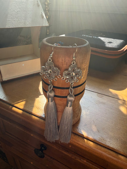 Fringe belief earrings: gray and distinguished