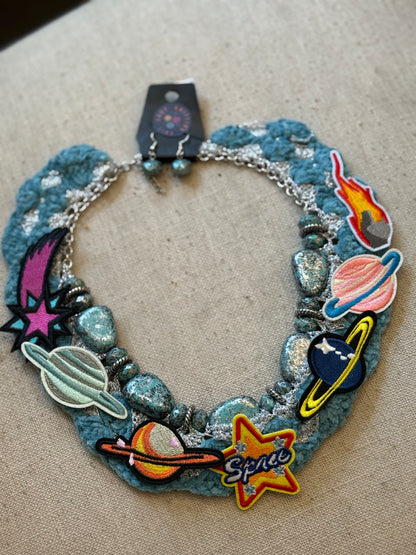 Love bomb collar and earrings: cults always promise space travel