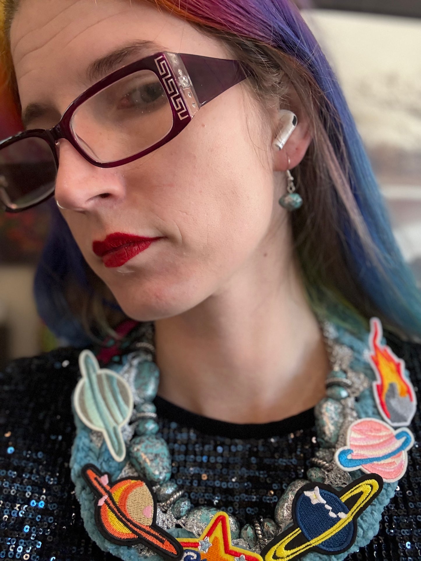 Love bomb collar and earrings: cults always promise space travel