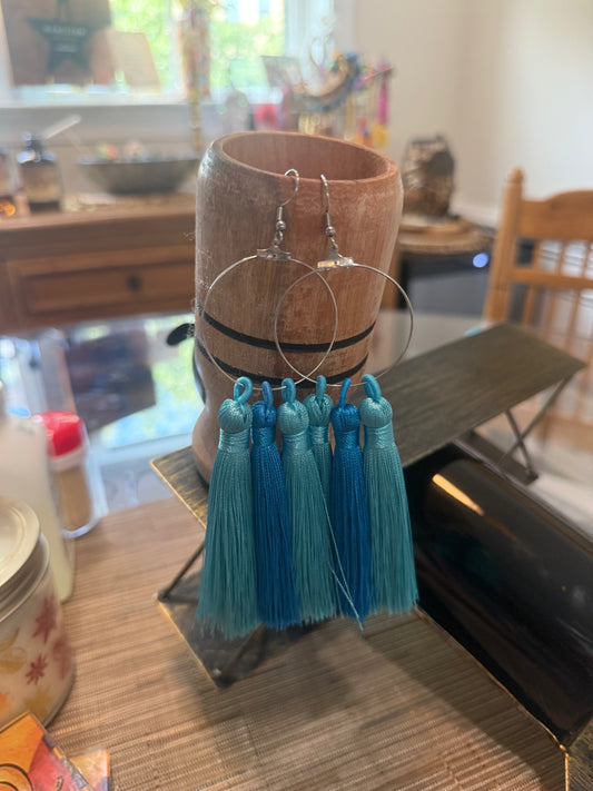 Fringe belief earrings
