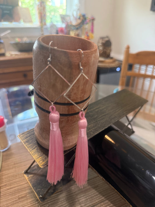 Fringe belief earrings