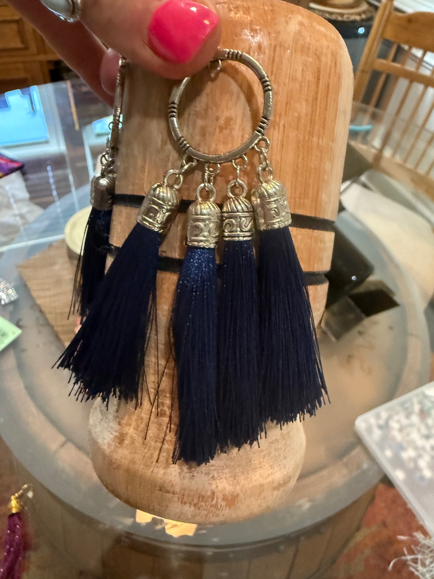 Fringe belief earrings